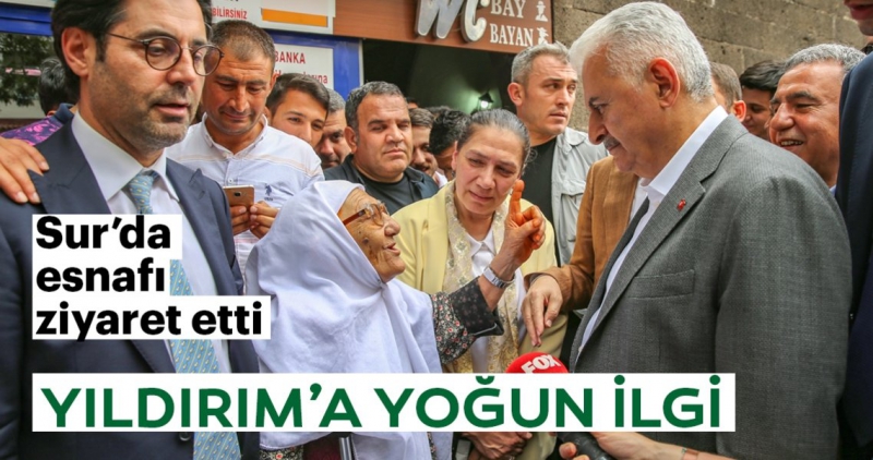 Yıldırım, esnaf ve vatandaşların yoğun ilgisiyle karşılaşırken, bol bol fotoğraf çektirdi.