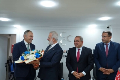AK Parti Grup Başkanvekili Yenişehirlioğlu'ndan MHP Manisa İl Başkanı Savaş'a ziyaret