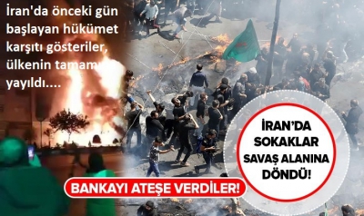 İran'da protestocular banka ve güvenlik ofislerini yaktı