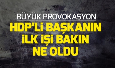 Kayyumdan belediyeyi alan HDP'li başkan Türk bayrağını indirdi.
