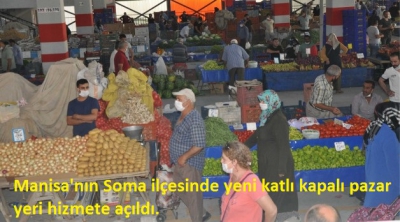  Manisa'nın Soma ilçesinde yeni katlı kapalı pazar yeri hizmete açıldı..